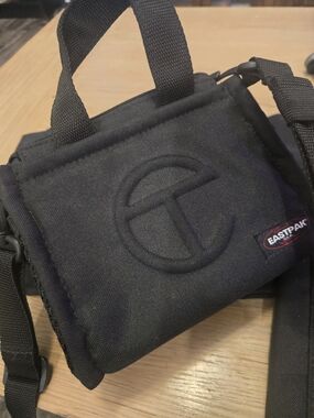 Eastpak Black Compact Crossbody Belt Bag with Embossed Logo